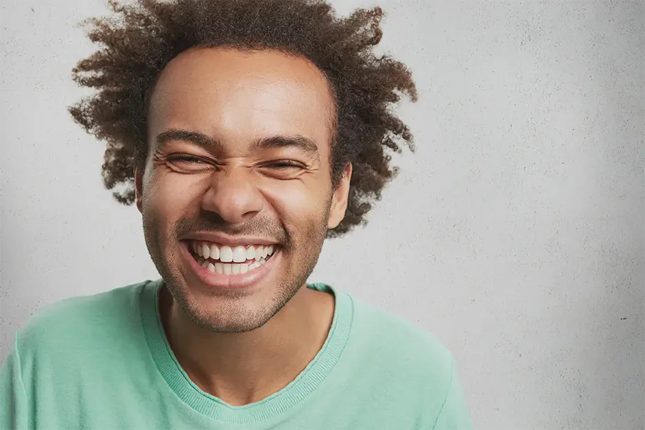 cheerful overjoyed young man