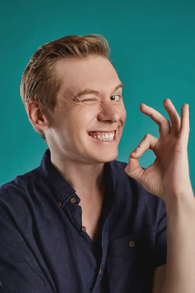 Portrait of a young teen boy after clear aligner treatment