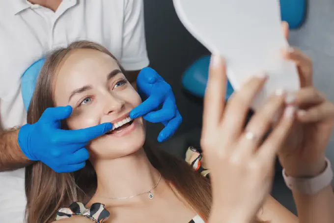 a white teeth by a dentist