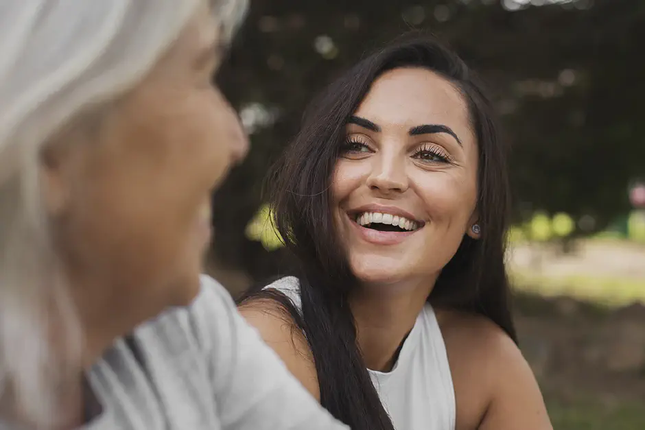 Female friends with different ages outdoors
